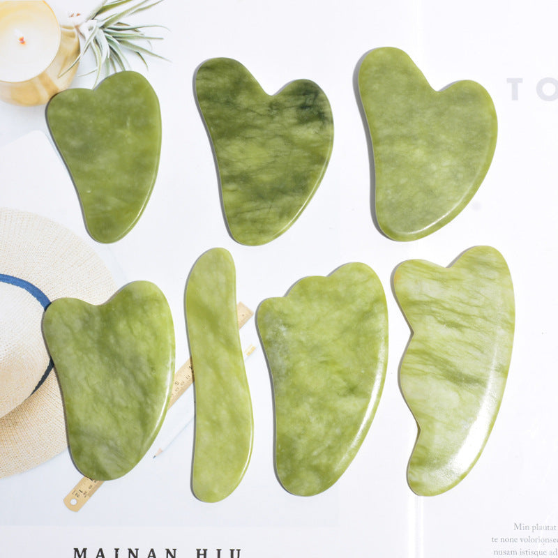 Planche de massage Gua Sha en jade Green Phoenix pour soins du visage