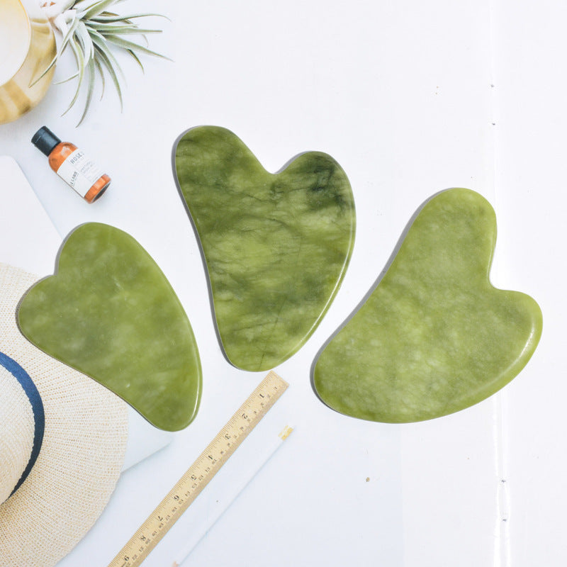 Planche de massage Gua Sha en jade Green Phoenix pour soins du visage